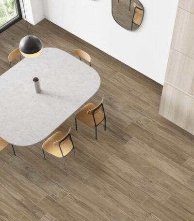 Porcellanato Madison Brown marca Alberdi en piso en un ambiente